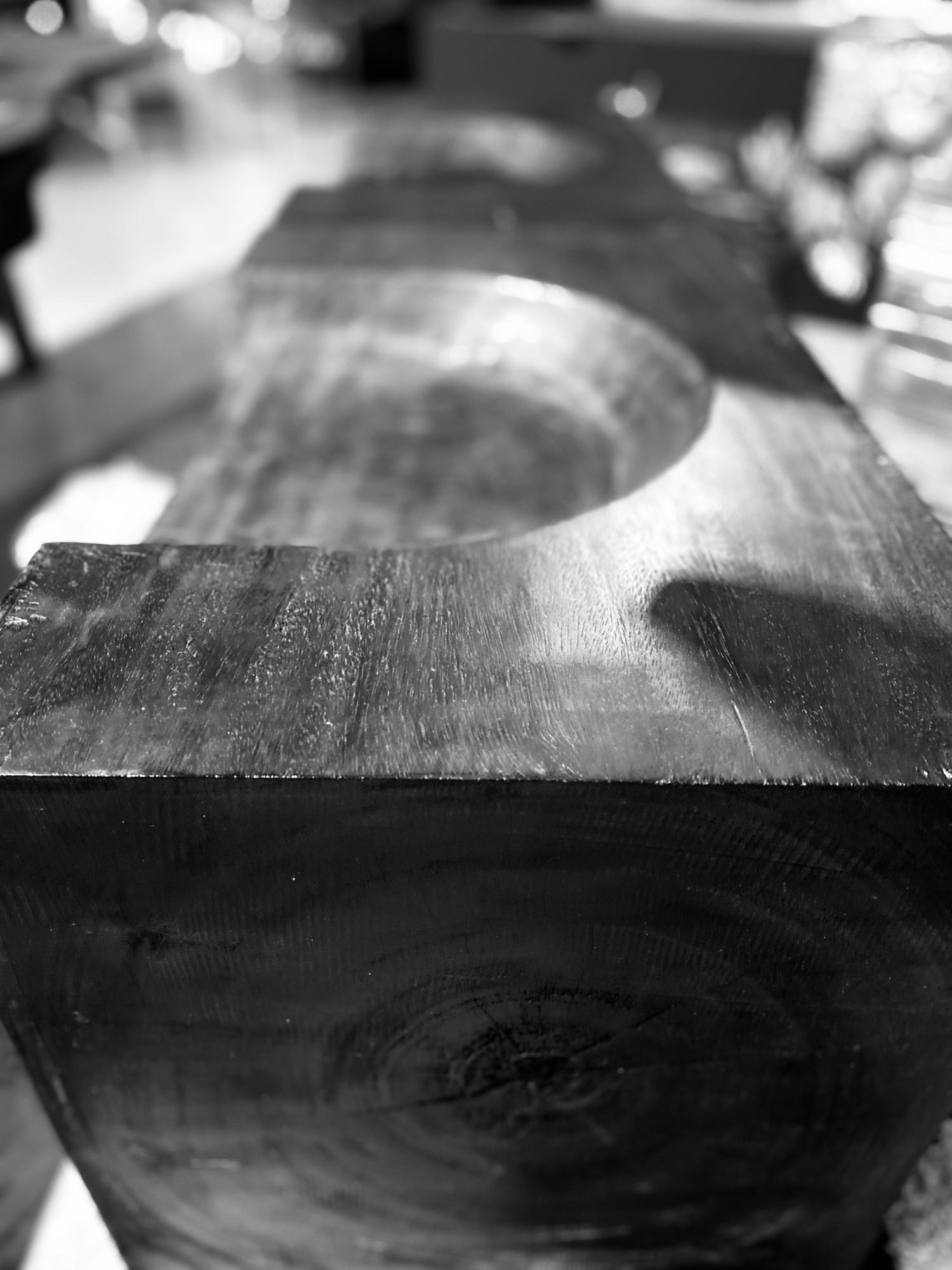 charred wooden bench