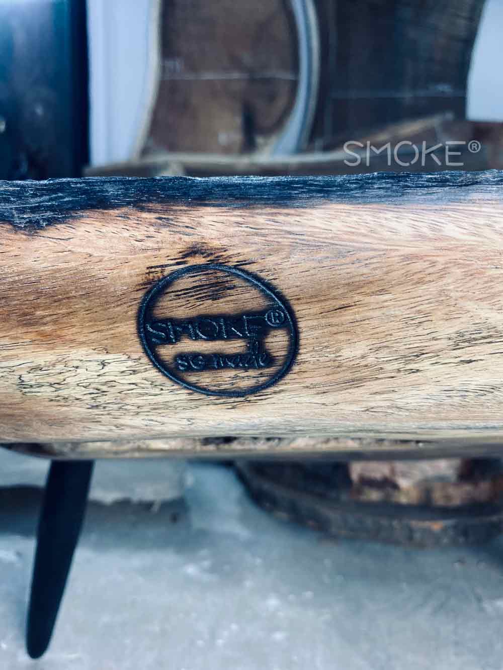 brand on charred coffee table