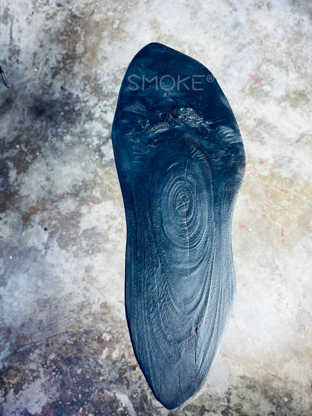 charred black side table